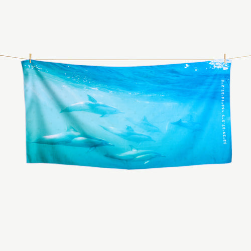 Dolphin Play beach towel