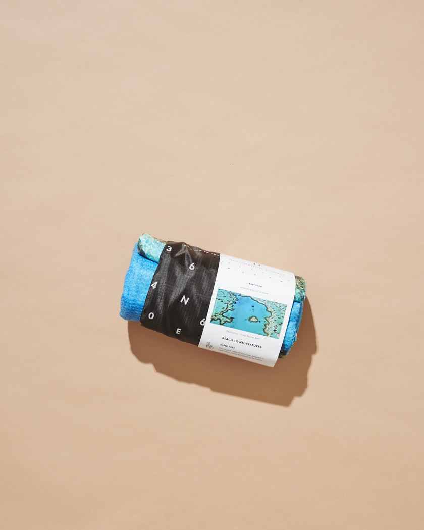 Beach towel arrives as a neat banded roll